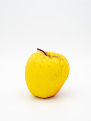 yellow apple on a white background
