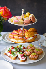 Traditional afternoon tea with canapes and cakes