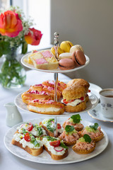 Traditional afternoon tea with canapes and cakes