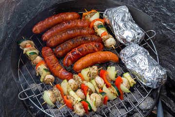 Summer Grill. Grilled sausage and skewers.