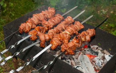 Cooking of shish kebab on charcoal grill 