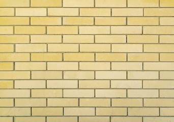 Yellow color brick wall for brickwork background design