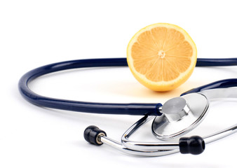 Stethoscope with lemon, isolated on white background