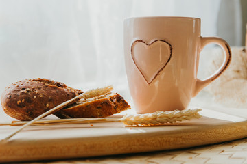 fresh summer breakfast with bread and milk, natural background