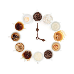 Fototapeta na wymiar Clock made with cups of coffee and beans as lancets on white background