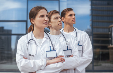 Fototapeta premium close up. group of confident medical professionals standing in a row.