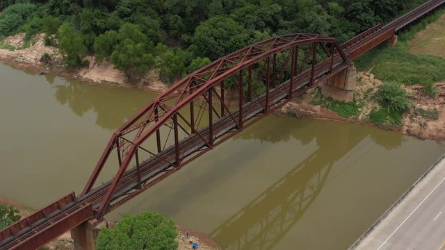 Clear span railroad bridge over a river, Brazos County, Texas, USA
