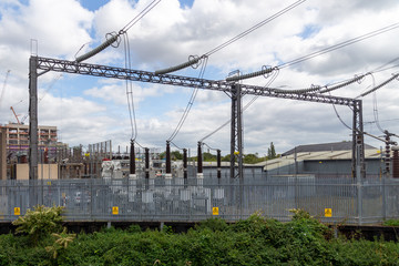 High voltage electrical cables and insulators in a power substation