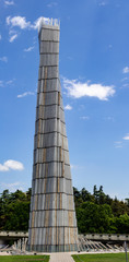 Fototapeta na wymiar July 13, 2019 - Tbilisi, Georgia - Heroes Square was built to honor the lives lost in military conflicts. It consists of a tall tower inscribed with names of victims and an eternal flame