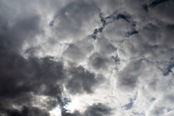 Beautiful sky with volumetric clouds, and the rays of the sun.