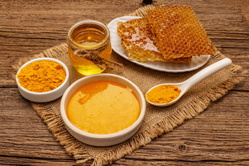 Spa concept. Self care with honey and turmeric. Natural organic cosmetics, homemade product, alternative lifestyle. Vintage background
