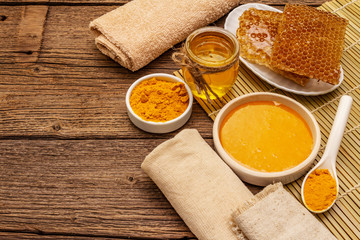 Spa concept. Self care with honey and turmeric. Natural organic cosmetics, homemade product, alternative lifestyle. Vintage background