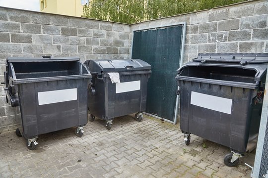 Trash containers for a block of flats