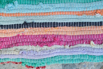 Close-up of rug woven from colored threads