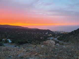 Crete road and mountains, beautiful evening sunset