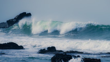 waves crashing on the rocks