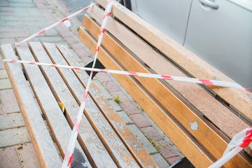 Barrier tape - quarantine, isolation, entry ban. Do not cross tape  on the bench