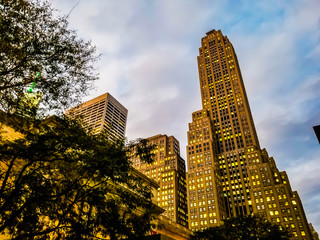 Midtown skyscrapers by Bryant Park taken from street level.