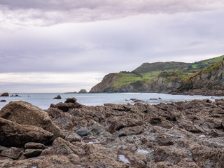 View of the coast, the Cantabrian Sea and the `La Soledad` beach from `El Tunel` in Laredo on a...