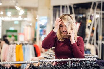 Close up portrait of a young stylish teenager talking on a phone