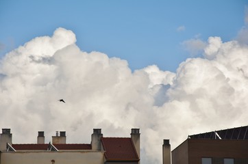 clouds over the houses in the city