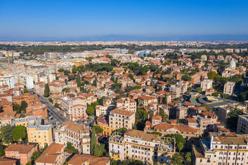 Fototapeta na wymiar Aerial view of Italian buildings, houses and apartments from above, Rome cityscape.