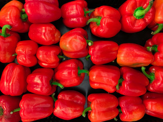 Fresh sweet red peppers top view