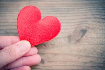 hands holding heart give love philanthropy donate help warmth take care valentines day  health care...