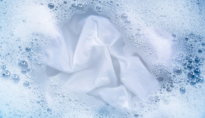 Soak a cloth before washing, white cloth