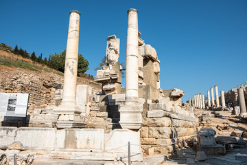 Kusadasi, Turkey - April 28, 2019: People visiting Celsus Library and old ruins of Ephesus or Efes famous site