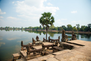 Fototapeta na wymiar Ancient pier monument pond landscape, Khmer temple 