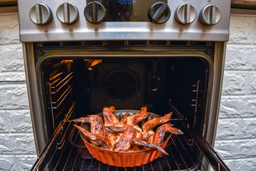 baked chicken wings in the oven at home during quarantine isolation