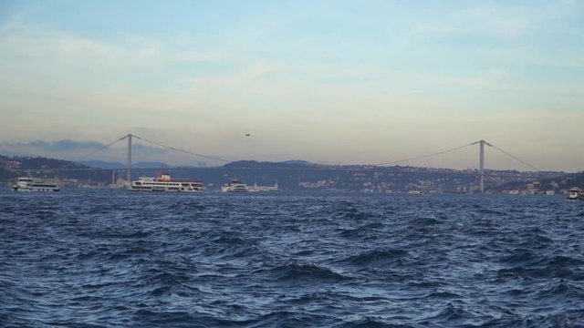 Istanbul, Turkey, SEP 31, 2018: Bosphorus Bridge at sunset connects Europe and Asia. far shot .Part4