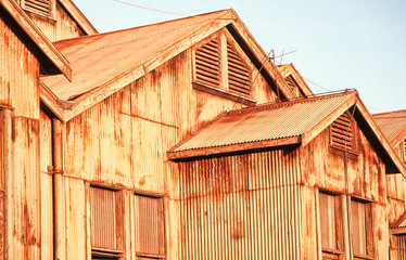 Naklejka premium Detail of old and very rusted industrial building