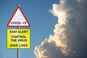 Revised United Kingdom government virus prevention message designed to commence unlocking the economy on cloud background