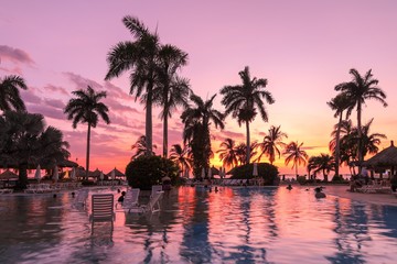 Fototapeta na wymiar sunset in the pool