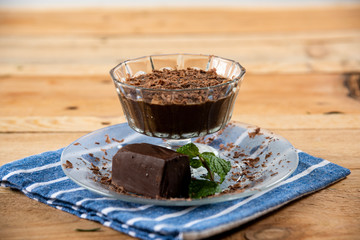 unsweetened chocolate mouse on a rustic wooden table