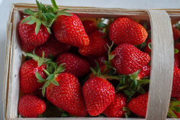 Fresh strawberries on a wooden table