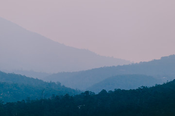 blue hour over the mountains in Tasmania with different layers of mountain ranges in the distance