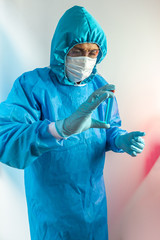 Male scientist worker making pharmacology substance using beaker at digital lights background
