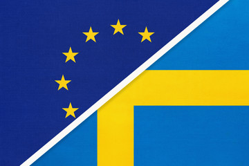 European Union or EU vs Sweden national flag from textile. Symbol of the Council of Europe association.