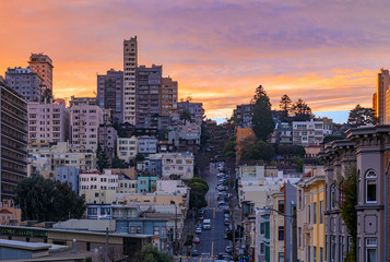 High angle view of homes on the famous crooked Lombard Street, San Francisco California with fiery...