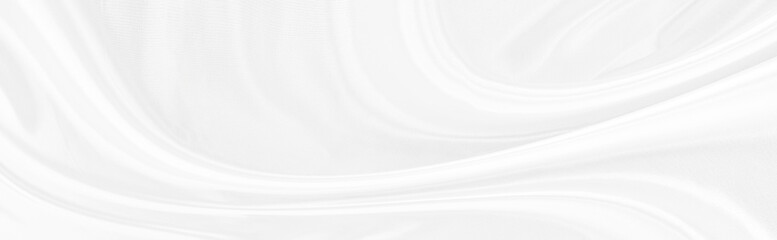 White gray satin texture that is white silver fabric silk background with beautiful soft blur pattern natural.