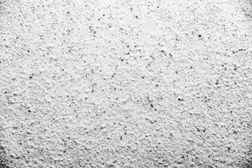 Texture of a concrete wall with cracks and scratches which can be used as a background