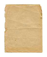 Vintage brown paper blank with torn edges isolated on white background. Old paper texture for design.