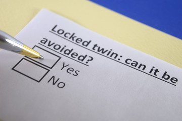 One person is answering question about locked twin.