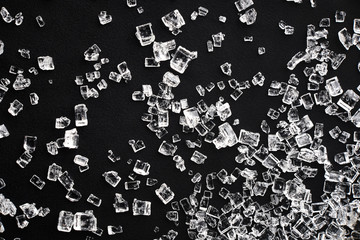 sugar crystals macro photo on black background