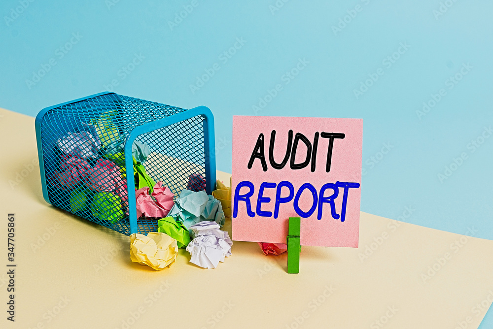 Poster writing note showing audit report. business concept for an appraisal of complete financial status of
