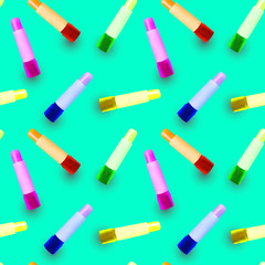 Seamless pattern with multicolored realistic lipsticks with shadows.