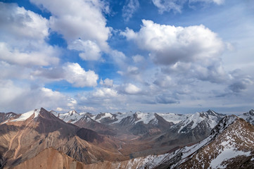 Majestic view of mountain ridges with snowy peaks and glaciers